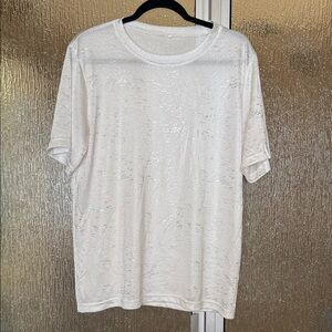 Women’s White Shirt with Silver accents.